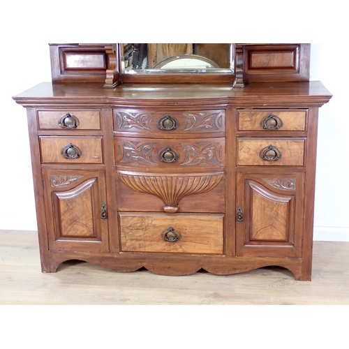 12 - A Victorian Art Noveau walnut mirror back Sideboard fitted seven drawers and pair of cupboard doors ... 