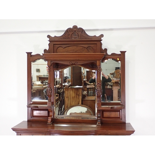 12 - A Victorian Art Noveau walnut mirror back Sideboard fitted seven drawers and pair of cupboard doors ... 