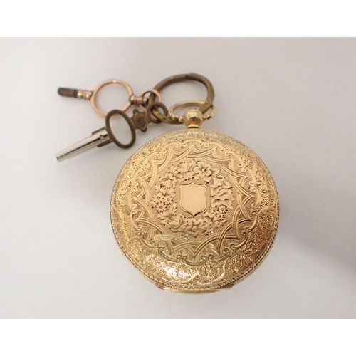 152 - An 18ct gold cased open faced Pocket Watch the floral engraved dial with roman numerals in engraved ... 