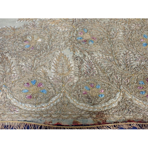 190 - An Indian silk and metal thread embroidered Panel on green ground A/F, 2ft 10in x 2ft