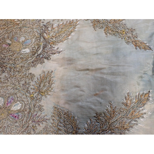 190 - An Indian silk and metal thread embroidered Panel on green ground A/F, 2ft 10in x 2ft