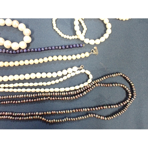 203 - A collection of bead and freshwater pearl Necklaces in various colours