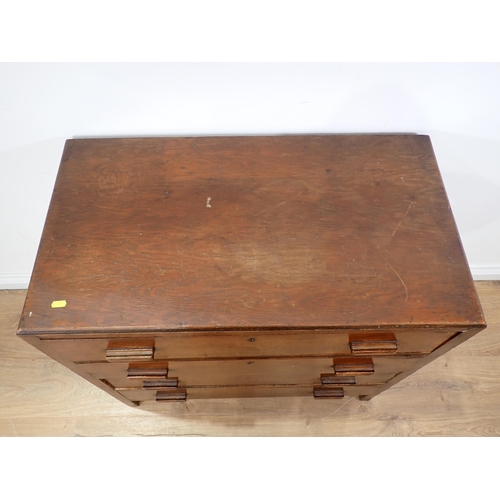 242 - A 20th Century oak veneered Chest of four long drawers