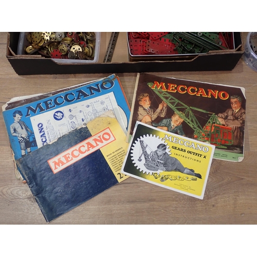 245 - A box of Meccano Accessories and a box of Instruction Manuals