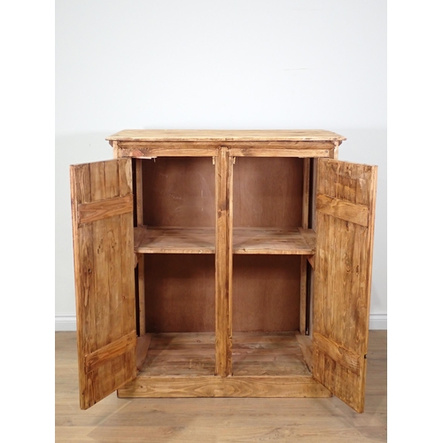 248 - A rustic pine two door Cupboard 3ft 10in H x 3ft 3in W