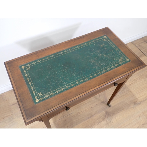 259 - A small Edwardian Desk with inset top, fitted frieze drawer on squared tapering supports and casters... 