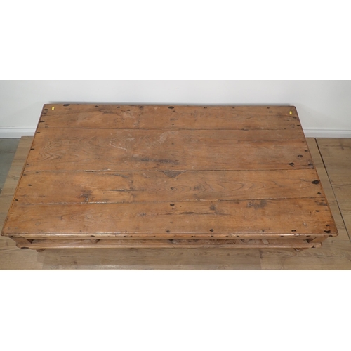 264A - A large Eastern hardwood Coffee Table, metal bound, gallery frieze and on turned supports, 5ft 10in ... 