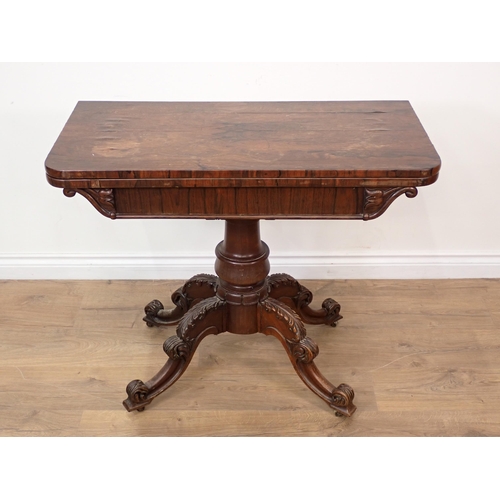 269 - A 19th Century rosewood Tea Table with fold-over top on turned column and carved quadruple base, A/F