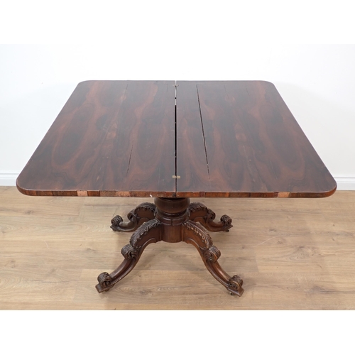 269 - A 19th Century rosewood Tea Table with fold-over top on turned column and carved quadruple base, A/F