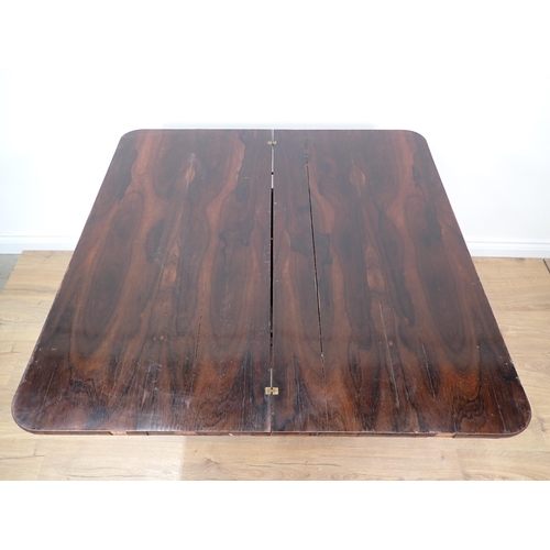 269 - A 19th Century rosewood Tea Table with fold-over top on turned column and carved quadruple base, A/F