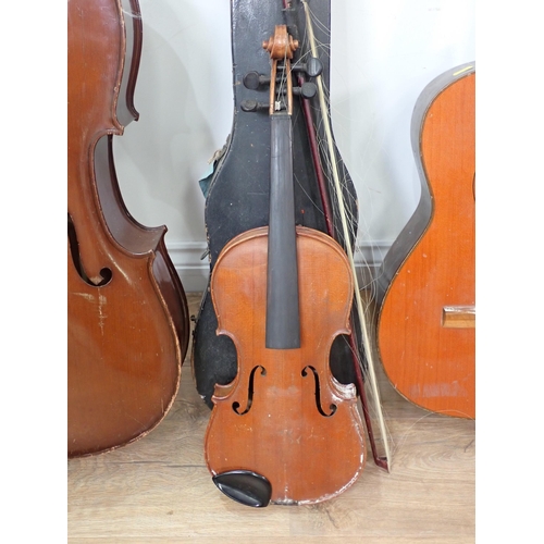 276 - A La Mancha Classical Guitar, a Mandolin in case, a Romanian small Cello and a Violin in case