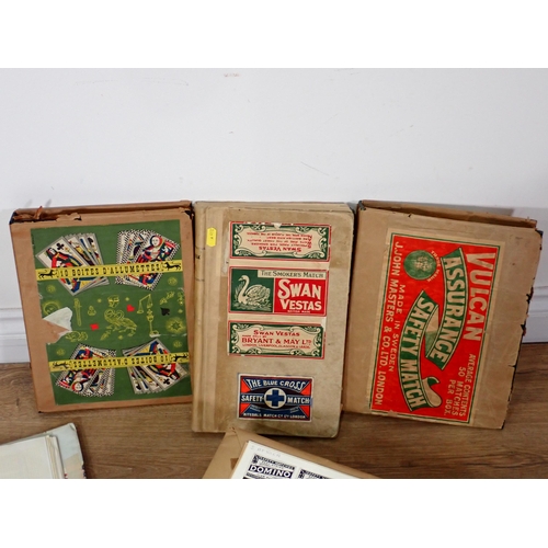 297 - Six Albums of match box covers, a book listing match box covers and a box containing Match Boxes