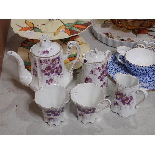 357 - A two person Coffee Set with pansy decoration, two glass Bowls, two Comports, Cake Stand and Copelan... 