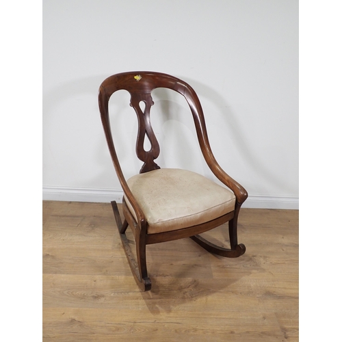 38 - A mahogany open Rocking Chair A/F