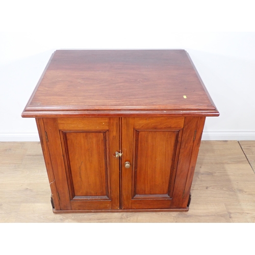 43 - A mahogany Cupboard with pair of panelled doors, one side and the back also panelled 2ft 9