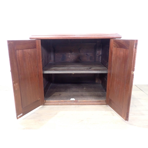 43 - A mahogany Cupboard with pair of panelled doors, one side and the back also panelled 2ft 9