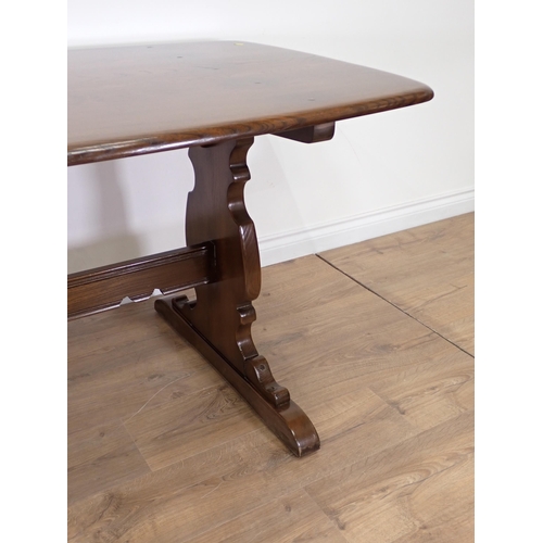 44 - A dark elm Ercol Dining Table 5ft 11