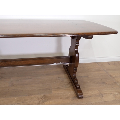 44 - A dark elm Ercol Dining Table 5ft 11