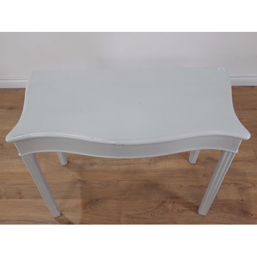 447 - A serpentine fronted white painted Side Table 2ft 11in W x 2ft 4in H