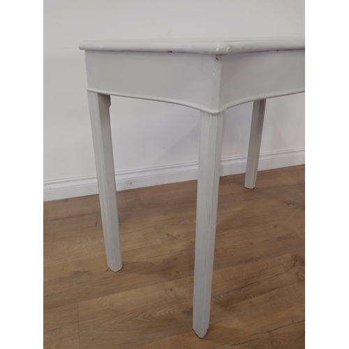 447 - A serpentine fronted white painted Side Table 2ft 11in W x 2ft 4in H