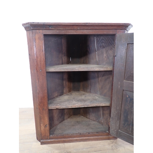 455 - An antique oak hanging Corner Cupboard 3ft 3in W x 2ft 9in W