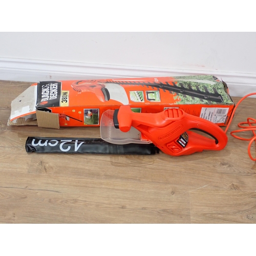 458 - A Flymo Turbo Lite 330 Lawn Mower and a Black & Decker electric Hedge Trimmer, passed PAT