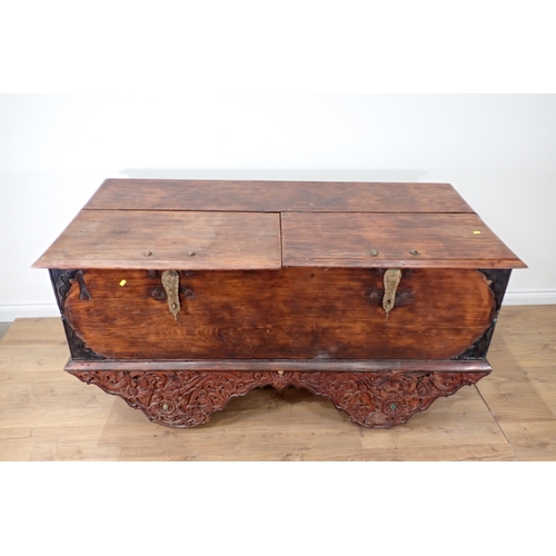 471 - A large Oriental hardwood Chest on carved and pierced supports A/F 5ft 6in W x 2ft 10in H