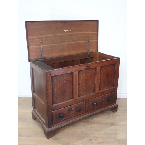 475 - An 18th Century oak three panel Mule Chest fitted two drawers to base mounted on ogee bracket feet 3... 