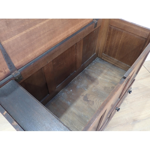 475 - An 18th Century oak three panel Mule Chest fitted two drawers to base mounted on ogee bracket feet 3... 