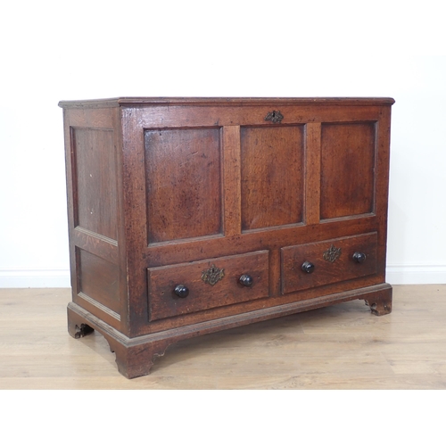 475 - An 18th Century oak three panel Mule Chest fitted two drawers to base mounted on ogee bracket feet 3... 