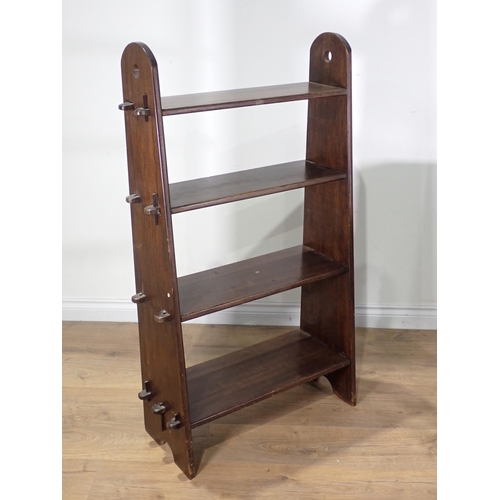 486 - An oak gateleg Table on barley twist supports, a Victorian Towel Rail and a four tier open Bookcase