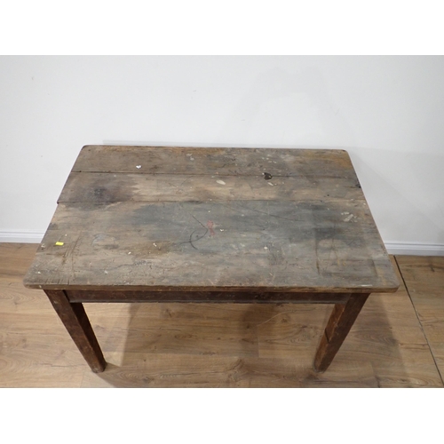 488 - An antique pine Farmhouse Table lacking end drawer mounted on square cut supports 4ft W x 2ft 6in H