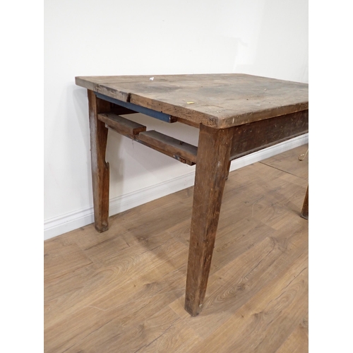 488 - An antique pine Farmhouse Table lacking end drawer mounted on square cut supports 4ft W x 2ft 6in H