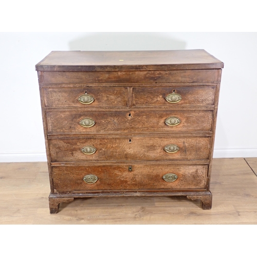 491 - A 19th Century oak and mahogany crossbanded Chest of two short and three long drawers mounted on oge... 