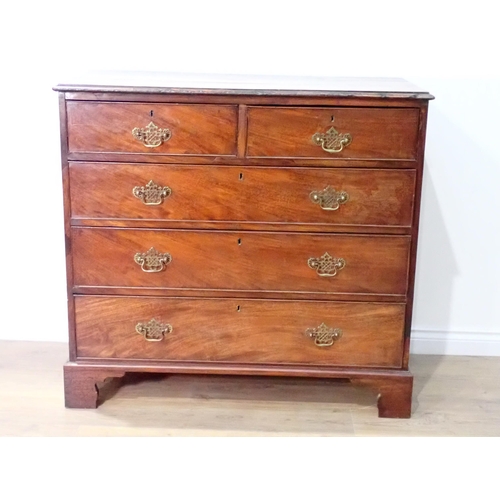 496 - A George III mahogany Chest of two short and three long drawers mounted on ogee bracket feet 3ft 7in... 