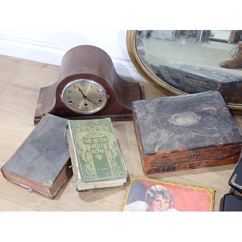 50 - A Singer Sewing Machine, failed PAT, an oak cased Mantel Clock, oval Wall Mirror, a large Bells Whis... 