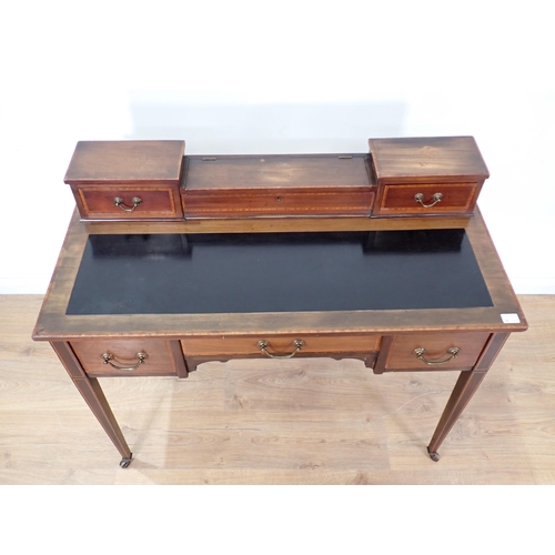 51 - A late 19th Century walnut Writing Table on square tapering supports and casters, 2ft 10