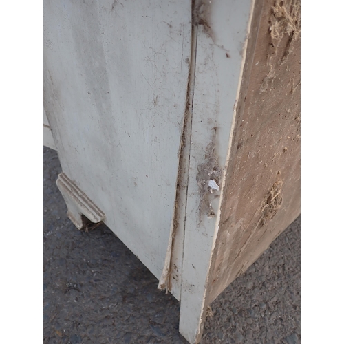 510 - A white painted two door Cupboard 3ft 7in H x 3ft 1in W