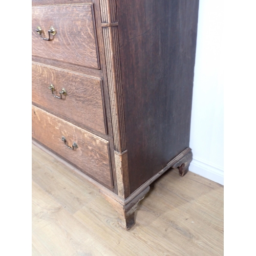 515 - A Georgian oak Chest of two short and four long drawers mounted on shaped ogee bracket feet 4ft 10in... 