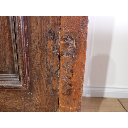 516 - An 18th Century and later joined oak Press Cupboard fitted pair of fielded panel doors above two dra... 