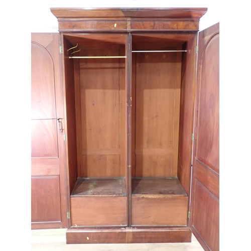 519 - A 19th Century mahogany Wardrobe fitted pair of arched panel doors on plinth base 7ft 3in H x 4ft 5i... 