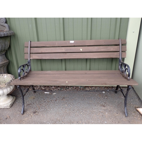 534 - A Garden Bench with metal supports and wooden slats 4ft W