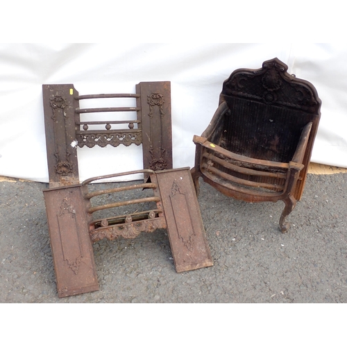 543 - An antique cast iron Fire Basket and two Fire Grate Fronts