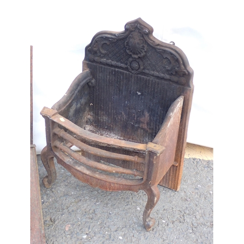 543 - An antique cast iron Fire Basket and two Fire Grate Fronts