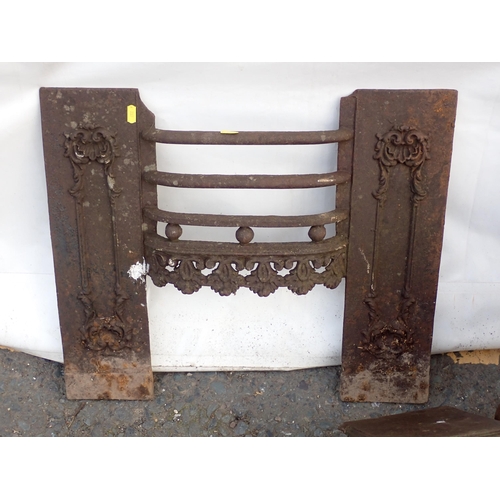 543 - An antique cast iron Fire Basket and two Fire Grate Fronts