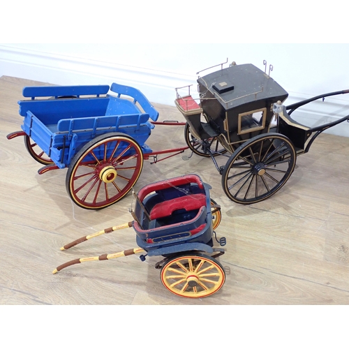 55 - Six painted wooden Carts and Carriages