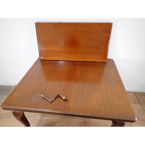 60 - A 19th Century mahogany extending Dining Table with single spare leaf mounted upon cabriole supports... 