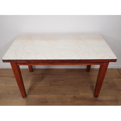 69 - A pine Kitchen Table with melamine top 4ft 5in W x 2ft 6in H