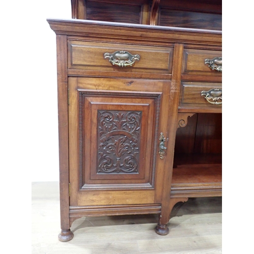 81 - A Victorian mahogany dog kennel Sideboard with raised gallery back fitted four drawers above pair of... 