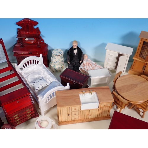 83 - A box of 20th Century dolls house Furniture and Dolls